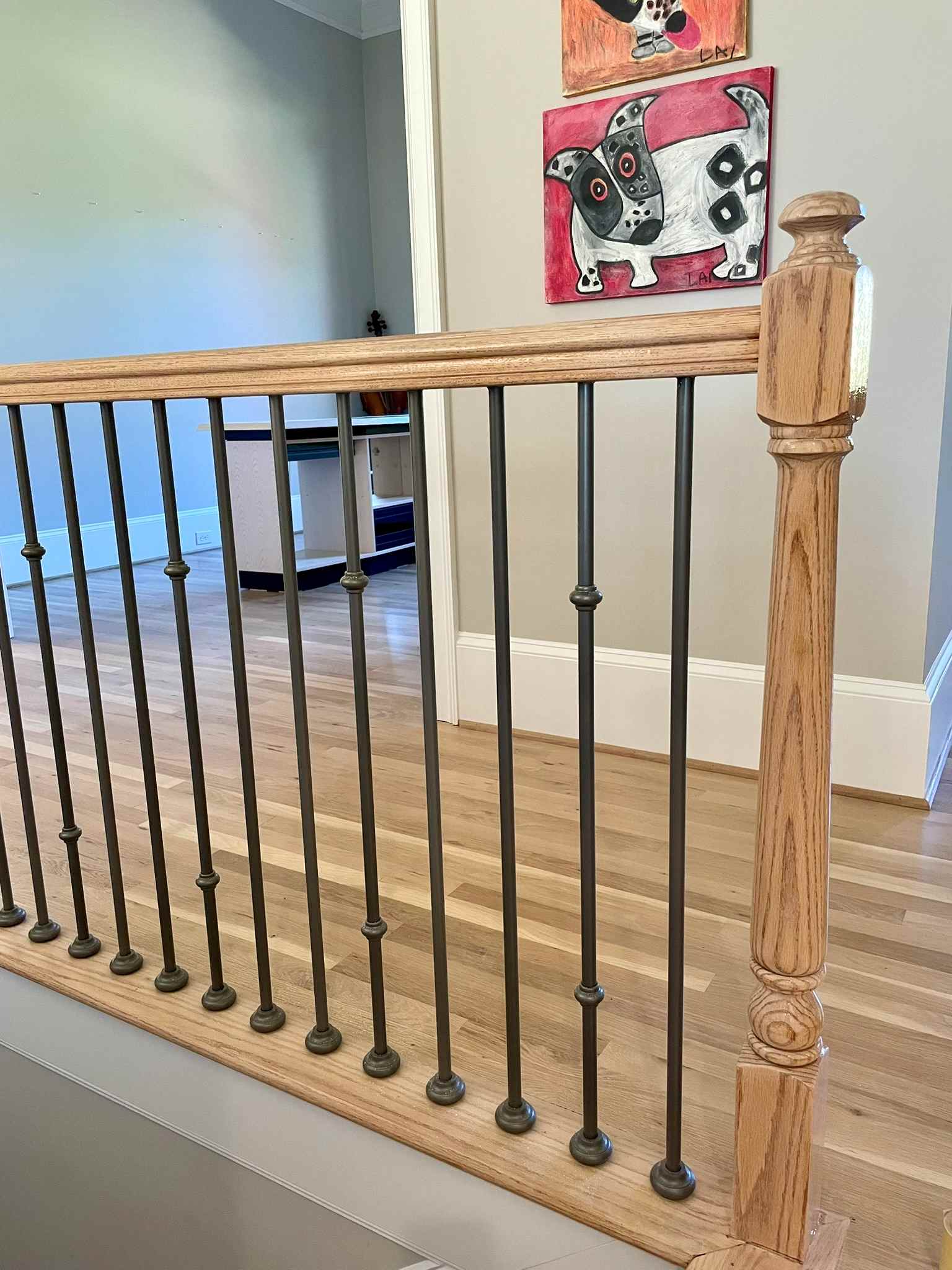 gray, round iron balusters, white oak floors 
