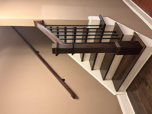 black stained rails